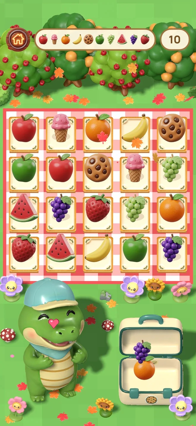 Ollie sourit près de sa boîte à lunch pleine de fruits après avoir trouvé toutes les paires