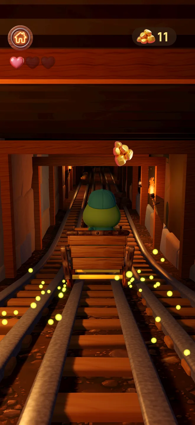 Ollie traverse le tunnel de la mine d'or en wagonnet